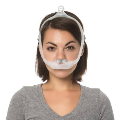 Woman Wearing CPAP Nasal Pillows Mask