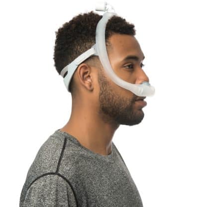 Man Wearing CPAP Nasal Pillows Mask