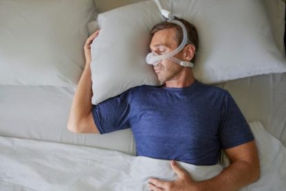 Man Sleeping with CPAP Nasal Mask - cpapRX