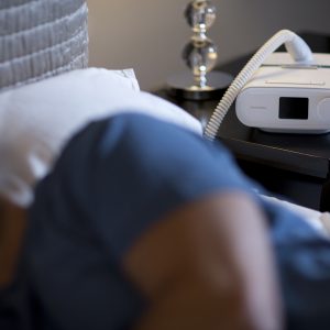 DreamStation CPAP Machine on Nightstand - cpapRX